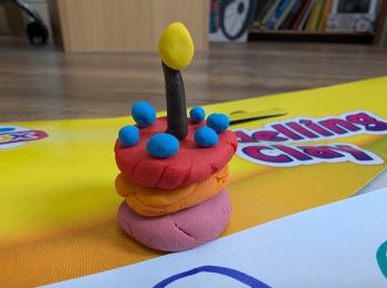 A small cake made out of modelling clay
